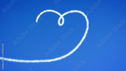 a heart in the blue sky