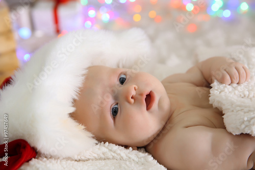 Cute naked baby in red hat ...
