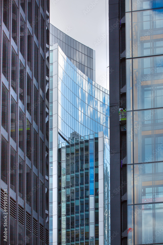 LONDON UK - SEPTEMBER 19, 2015 - Modern English architecture, Glass building texture and reflections. City of London 