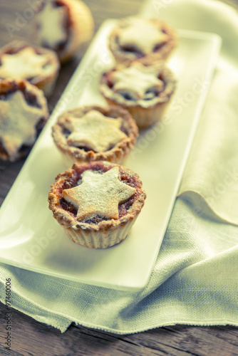 Mince pies with Christmas tree branch