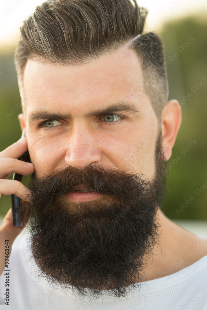 Fototapeta premium Closeup of man with phone