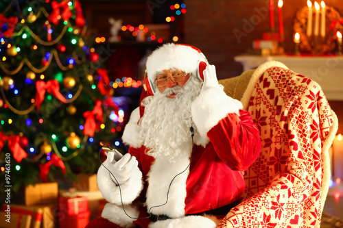 Santa Claus sitting with he...