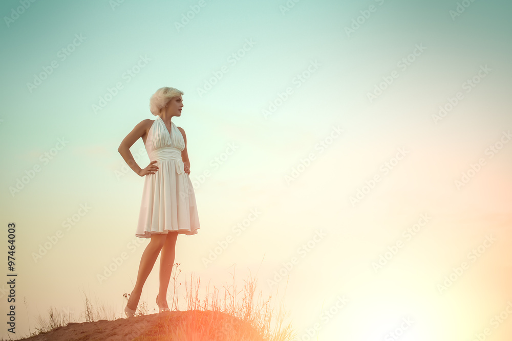 Woman in white dress outdoor