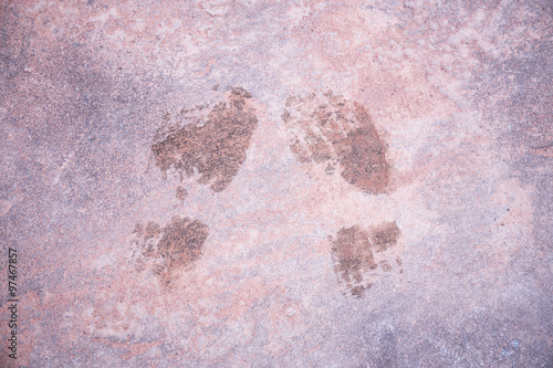 Shoe foot print on grunge concrete textured