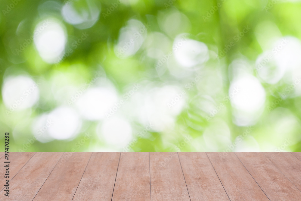 Wood table top on blurred nature abstract background. ready for product display Wood table top on blurred nature abstract background. ready for product display