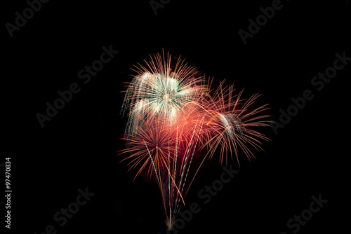 Brightly colorful fireworks in the night sky
