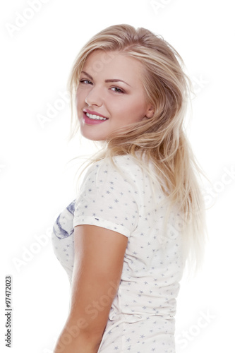 Close-up of a beautiful young woman smiling on white background © gcelebi
