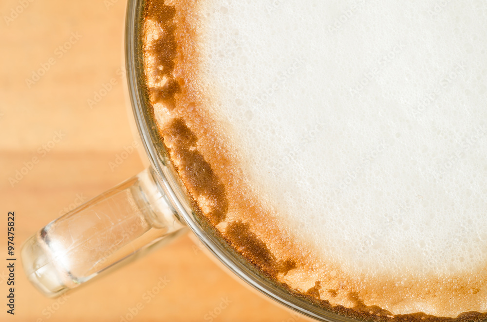 Close up foam milk on top of hot coffee Close up foam milk on top of hot coffee