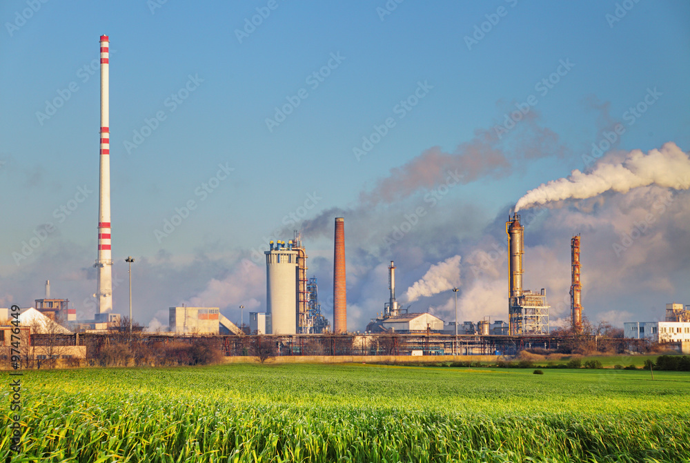 Oil refinery with vapor - petrochemical industry. Oil refinery with vapor - petrochemical industry.