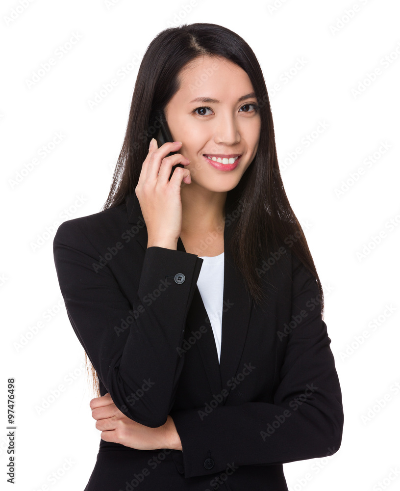 Asian Businesswoman talk to mobile phone Asian Businesswoman talk to mobile phone