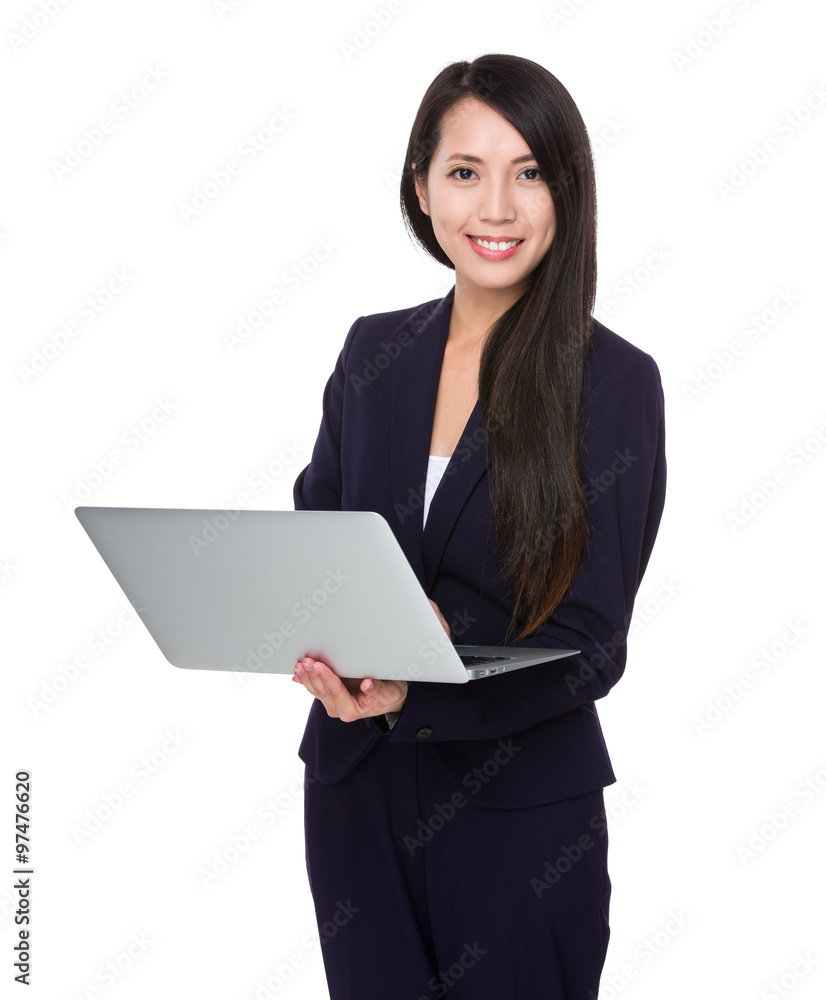Asian Businesswoman use of the notebook computer Asian Businesswoman use of the notebook computer