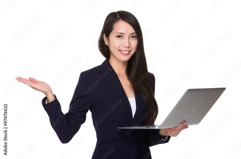 Young Businesswoman hold with laptop computer and hand showing b Young Businesswoman hold with laptop computer and hand showing b