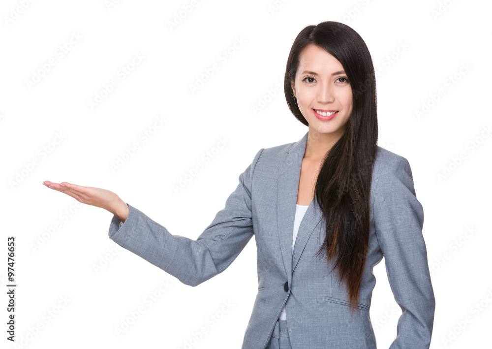 Asian Young Businesswoman with hand showing blank sign Asian Young Businesswoman with hand showing blank sign