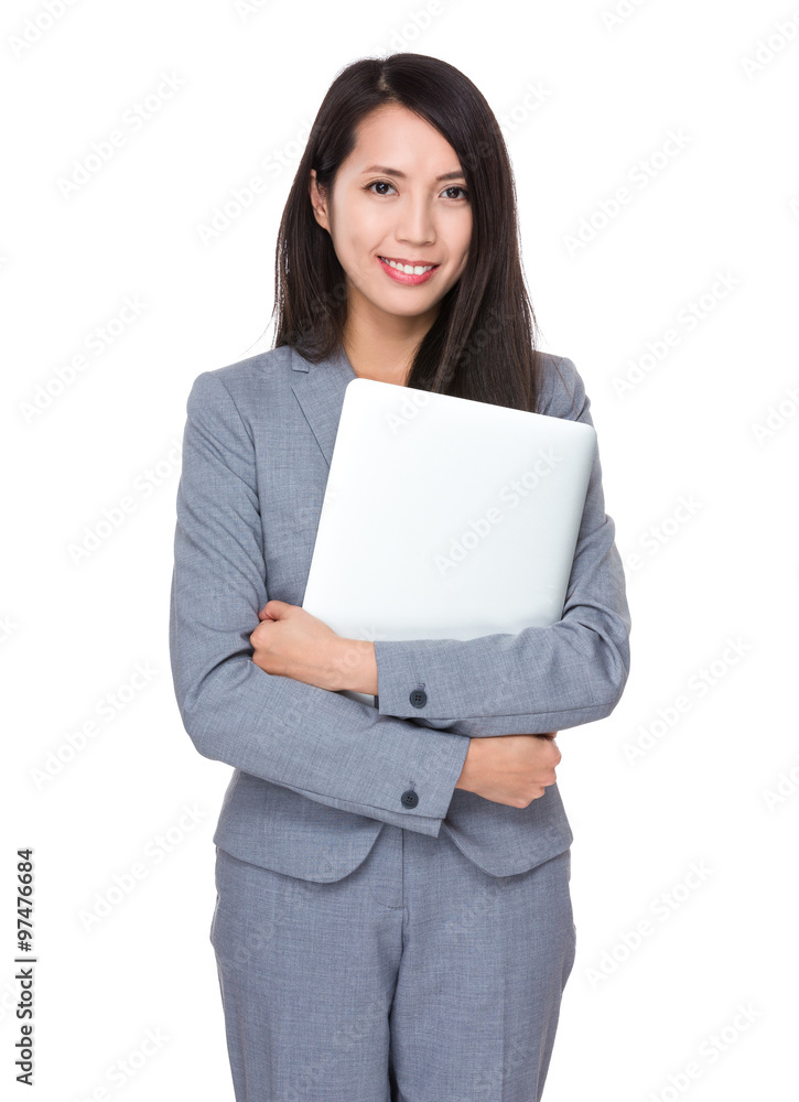 Young Businesswoman hold with laptop computer Young Businesswoman hold with laptop computer