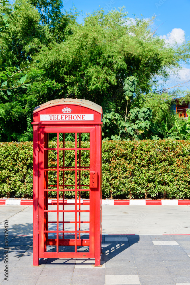 Red phone booths on the street Red phone booths on the street