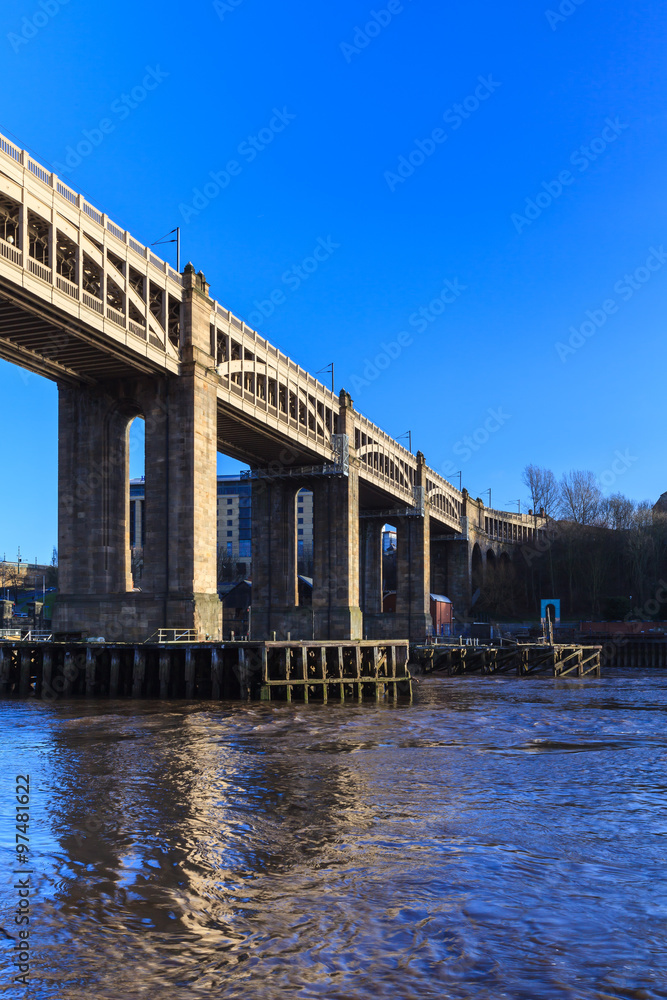 Naklejka premium High Level Bridge. The High Level Bridge is a road and railway bridge spanning the River Tyne between Newcastle upon Tyne and Gateshead in North East England.