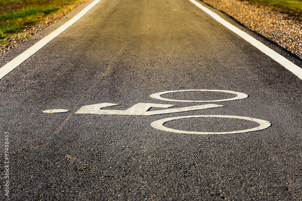 Obraz premium Road sign for bikes and cyclists outdoors.