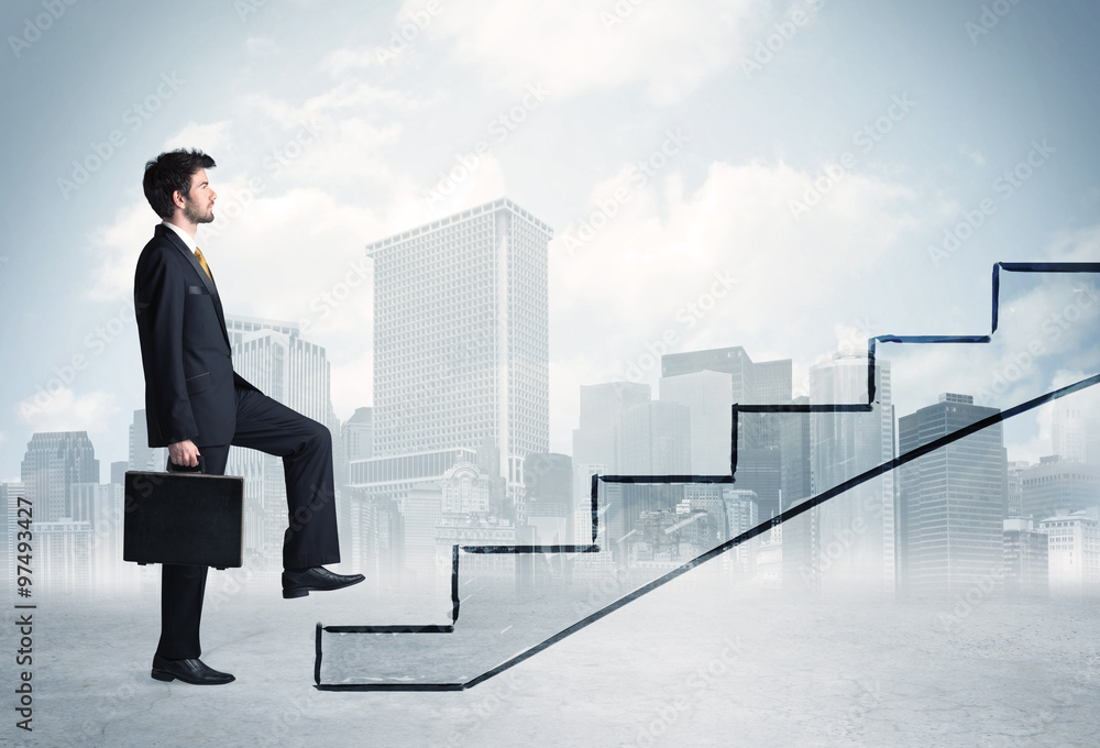 Business person in front of a staircase Business person in front of a staircase