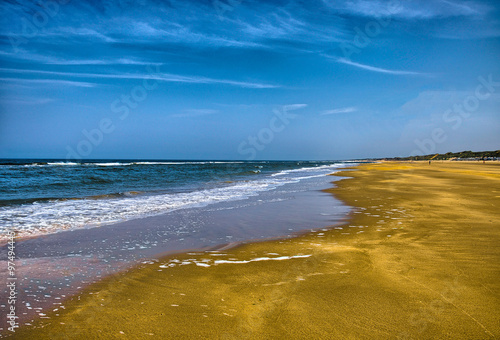 Beautiful sand beach with waves, North Sea, Zandvoort near Amste photo