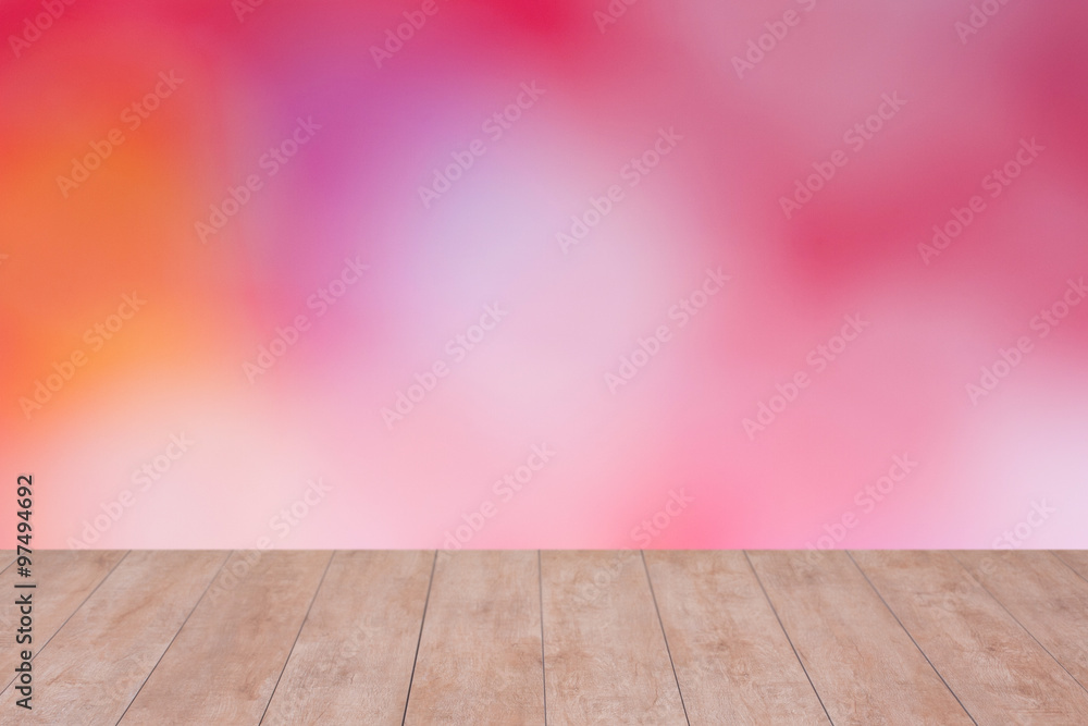 Wood table top on color abstract blurred background. ready for product display Wood table top on color abstract blurred background. ready for product display