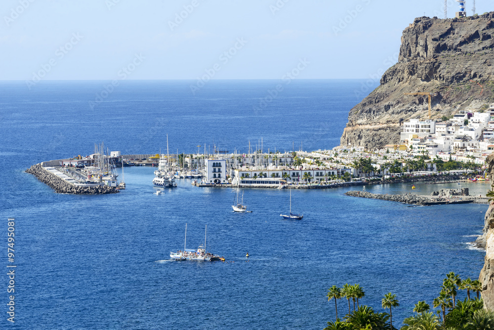 Aerial view of old town and marina Puerto de Mogan , Gran Canaria Island. This is popular winter tourist destination from Europe.
