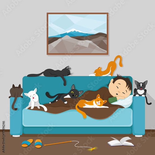 A man and his cats sleeping on the couch.