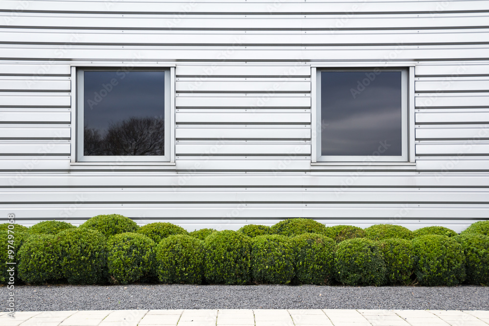 Fototapeta premium Front wall and entrance of a modern businessunit