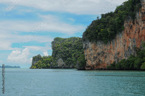 The Ochre Colours of the Rock Glow in Reds and Browns. Islands at Phang Nga Bay near Krabi and Phuket. Thailand.