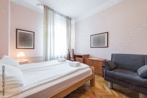 Hotel bedroom in pastel tones