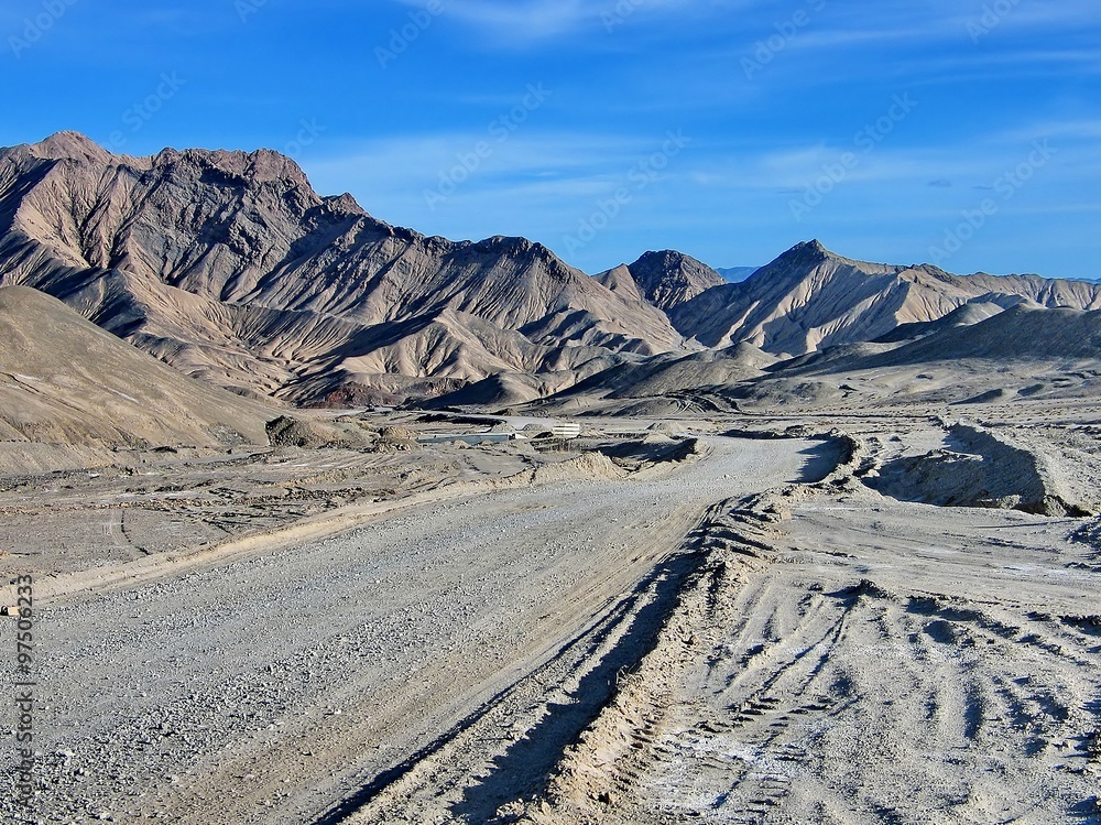 the sandy unpaved road on Tibetan Plateau the sandy unpaved road on Tibetan Plateau