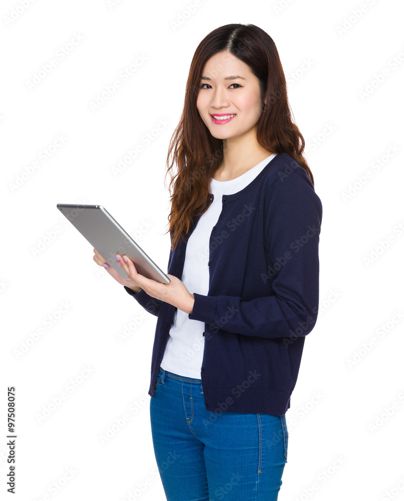 Asian woman use of the tablet pc Asian woman use of the tablet pc