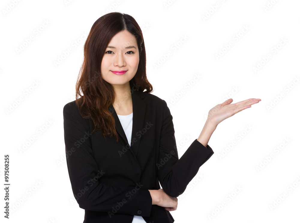Young Businesswoman with hand selling soemthing Young Businesswoman with hand selling soemthing