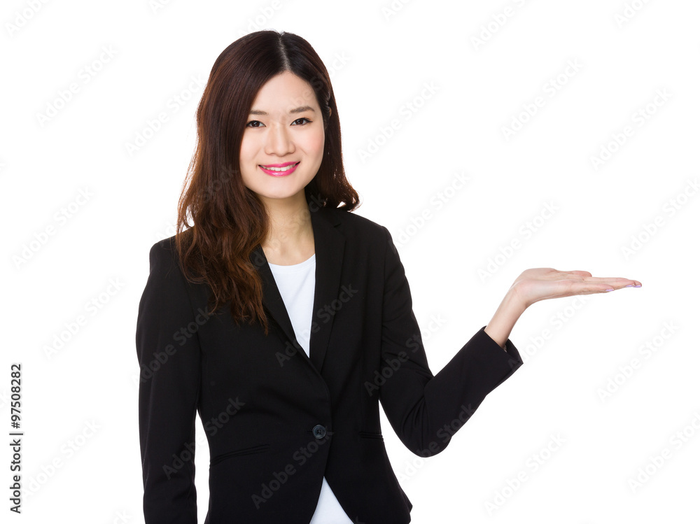 Asian Young Businesswoman showing open hand palm Asian Young Businesswoman showing open hand palm