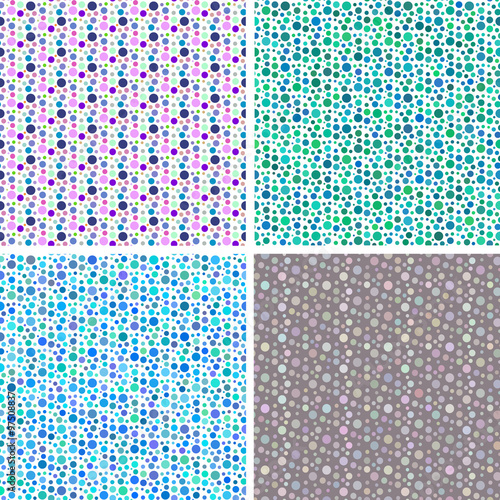 Dotted and circular seamless patterns set. Set of 4 colored dotted seamless patterns. Different sizes of circles.