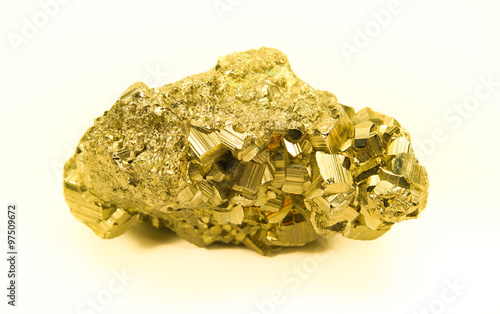 Block of gold rock isolated on white