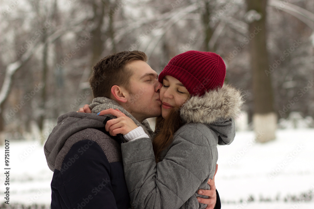 Boy kissing his girlfriend Boy kissing his girlfriend