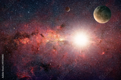 Planet in the background galaxies and luminous stars. Elements of this image furnished by NASA