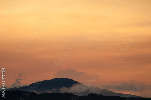 Fototapeta Naklejka Na Ścianę i Meble -  Hills with fog at sunrise