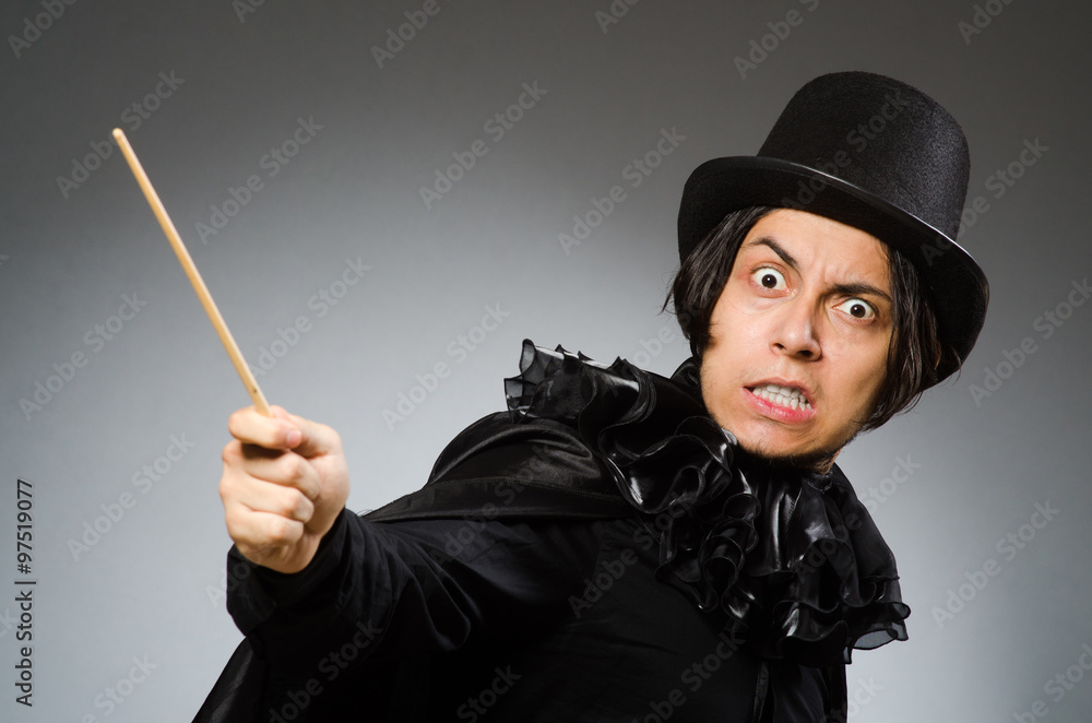 Funny magician wearing cylinder hat Funny magician wearing cylinder hat