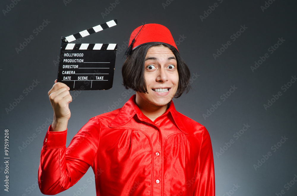 Man wearing red fez hat Man wearing red fez hat