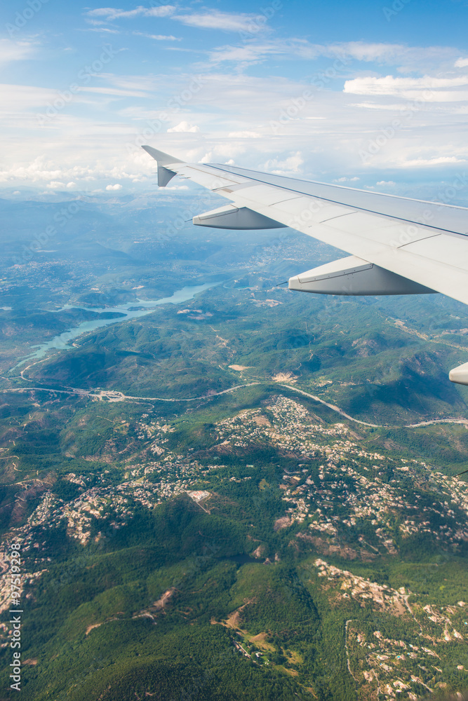 Airplane wing out of window Airplane wing out of window