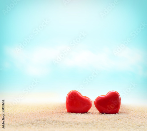 Two hearts on the summer beach