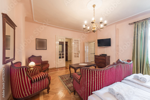 Hotel suite interior with classic style furniture