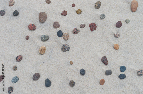 Sand structure with colorful pebbles - Baltic coast