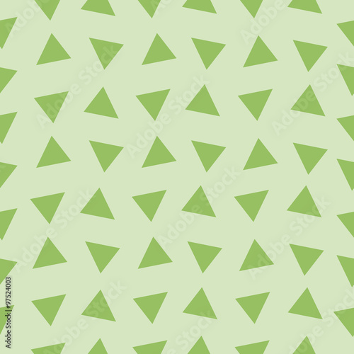 Seamless texture of the triangles on green. Vector illustration.