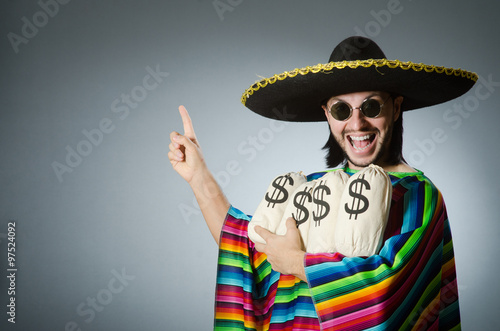 Mexican man with money sacks