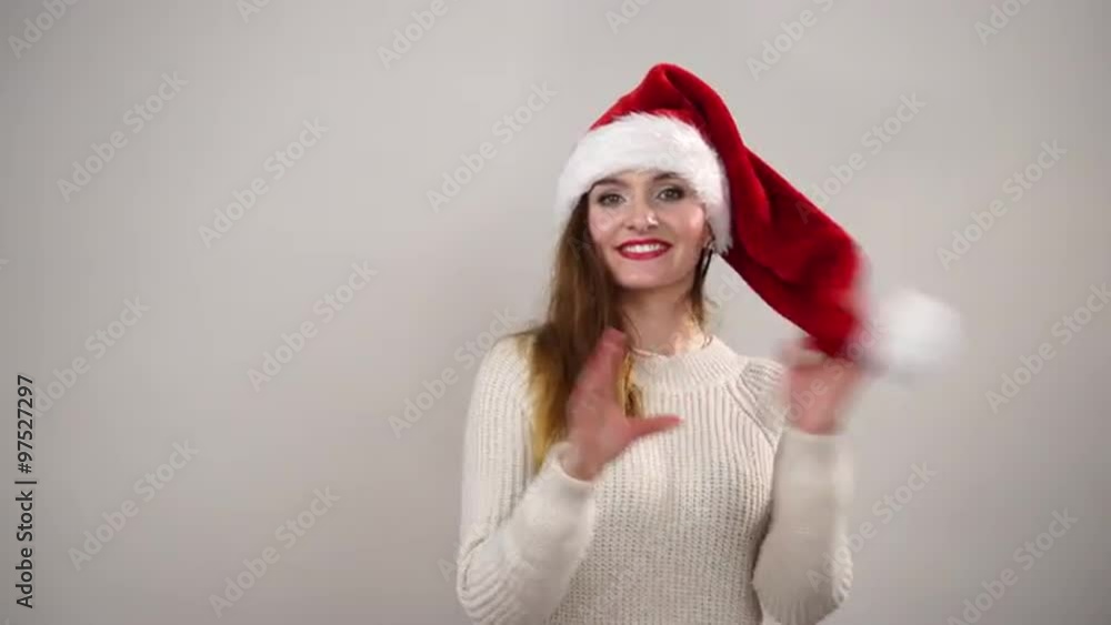 Woman playing with santa claus helper hat 4K Woman playing with santa claus helper hat 4K