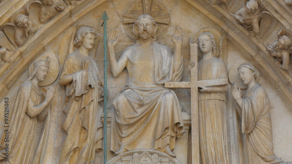 Carved image of Jesus and his apostles on the wall of the Notre Dame Cathedral in Paris Carved image of Jesus and his apostles on the wall of the Notre Dame Cathedral in Paris