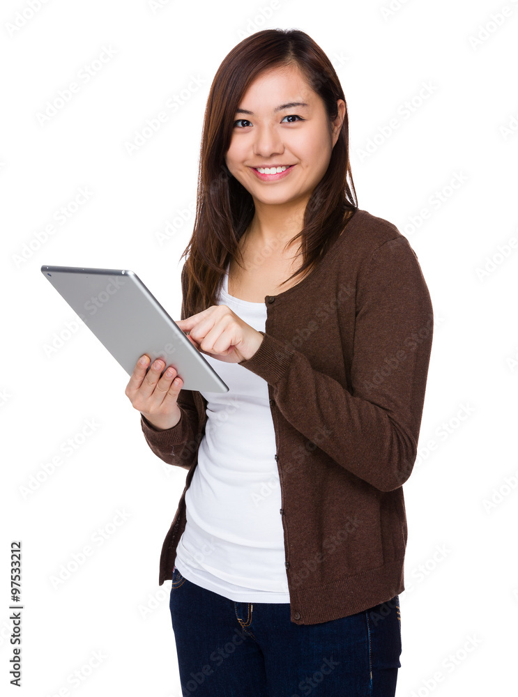 Asian Woman use of the tablet pc Asian Woman use of the tablet pc