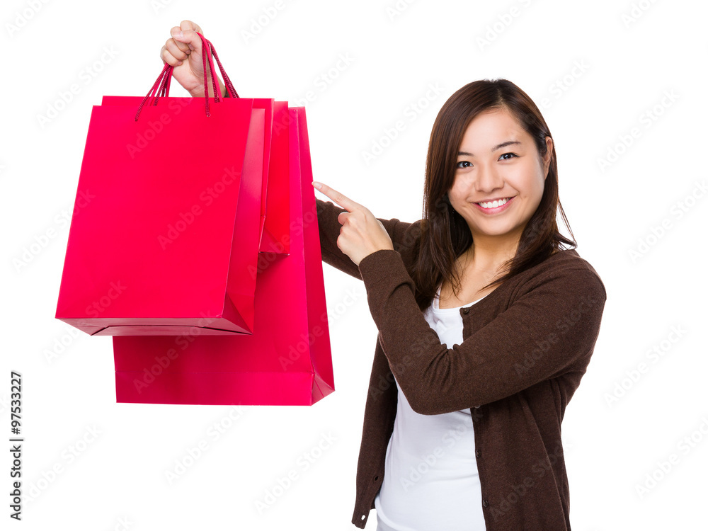 Asian Young Woman show with the shopping bag Asian Young Woman show with the shopping bag